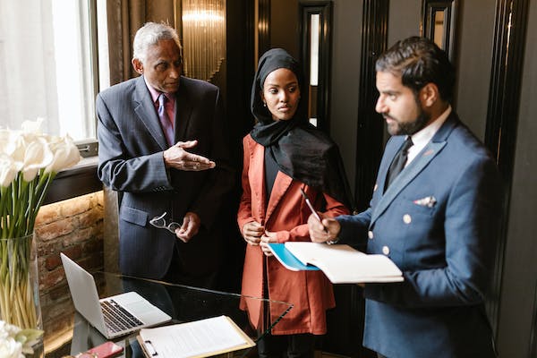 Business professionals discussing a project